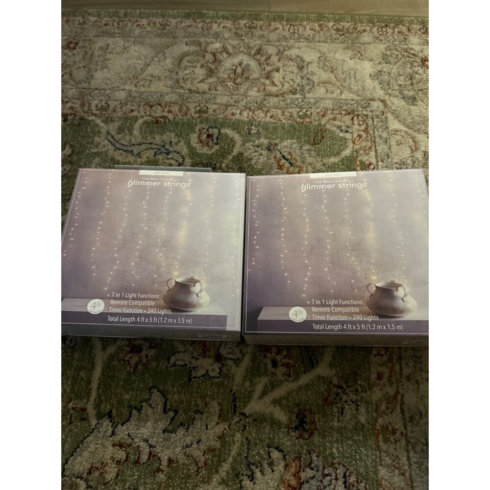 Glimmer Strings from Pier One (2 packages nee). Originally 79.95 retail